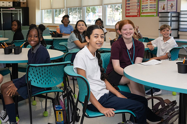 Middle school students in classroom.